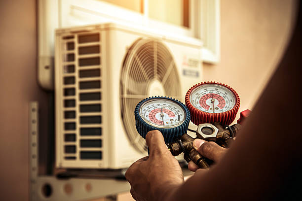 Professional Air Conditioning Service technician working in Burleson, TX
